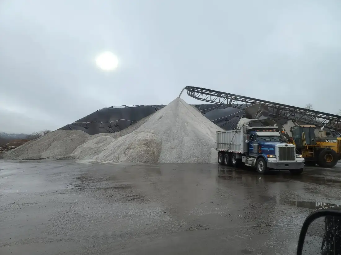 Commercial salt material supply and heavy equipment used for snow and ice management